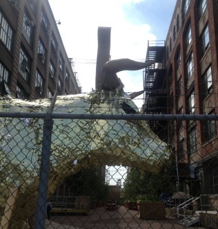 Golden calf pinata, constructed by Sunset Park artist Sebastian Errazuriz